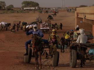 As famine looms in Sudan, the hungry eat soil and leaves