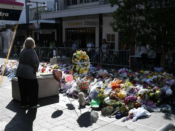 Bondi stabbing: Baby leaves hospital as mourners of Sydney mall attack gather for beach vigil