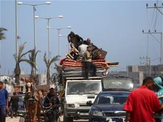 Palestinians flee chaos and panic in Rafah after Israel's seizure of border crossing