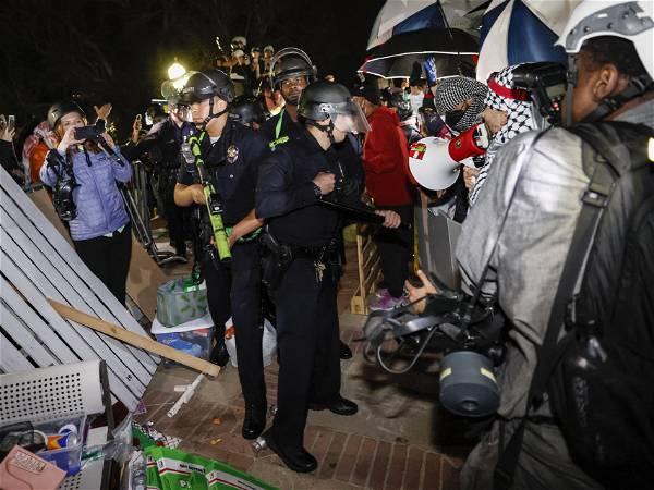 Police begin removing barricades at a pro-Palestinian demonstrators’ encampment at UCLA