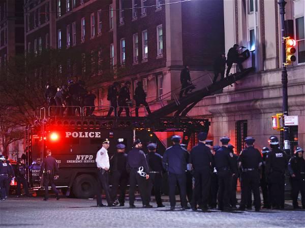 Police officer fired gun while clearing protesters from Columbia building, prosecutors say